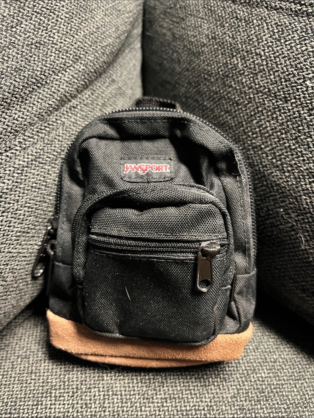Jansport Black Mini Backpack with Brown Base